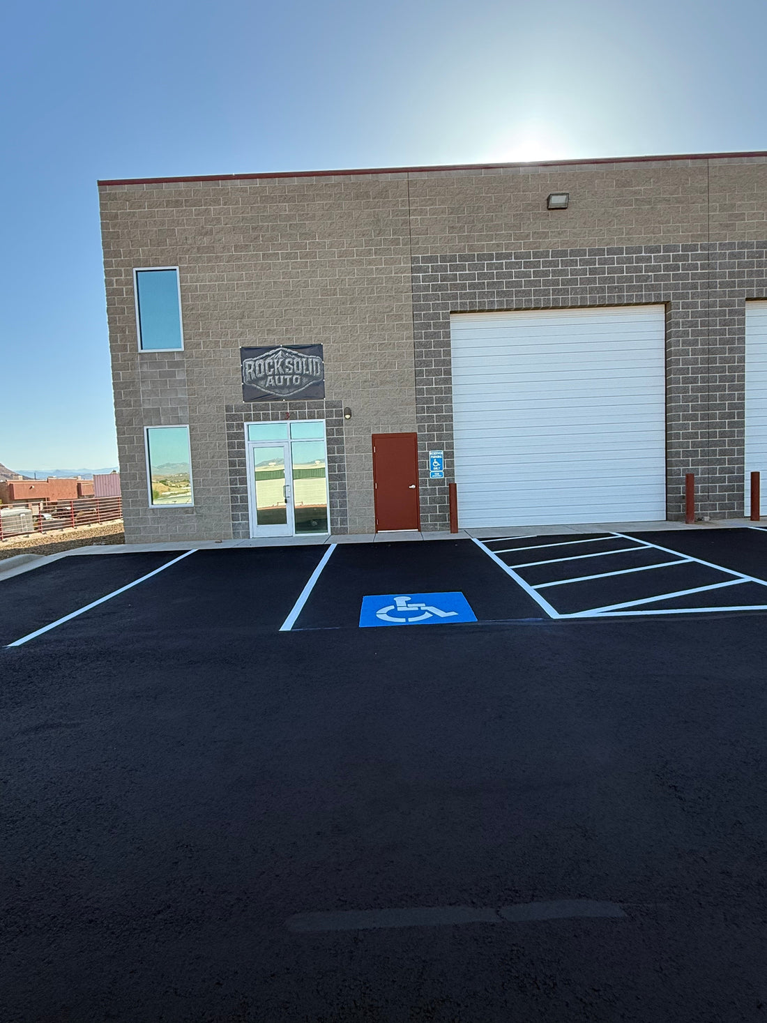 Asphalt Sealcoating and Striping: A Step-by-Step Owner's Guide
